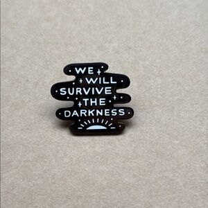“We will survive the darkness” Enamel Pin